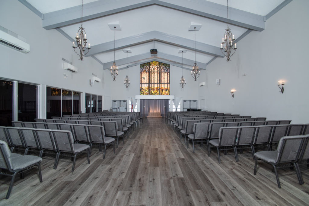 Traditional funeral service setup in our serene Greenback & I80 chapel, honoring a loved one’s memory.